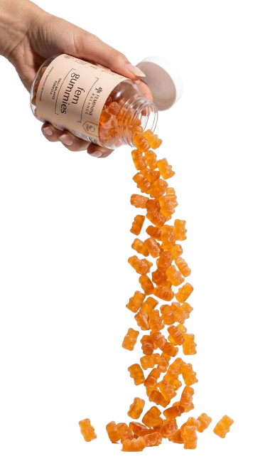 Hand pouring Fem Gummies orange bear gummies from the bottle